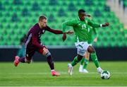 10 September 2024; Aidomo Emakhu of Republic of Ireland in action against Roberts Melkis of Latvia during the UEFA European U21 Championship qualifier match between Republic of Ireland and Latvia at Tallaght Stadium in Dublin. Photo by Tyler Miller/Sportsfile