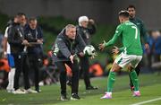 10 September 2024; Republic of Ireland head coach Heimir Hallgrimsson throws the ball to Callum Robinson of Republic of Ireland during the UEFA Nations League B Group 2 match between Republic of Ireland and Greece at Aviva Stadium in Dublin. Photo by Stephen McCarthy/Sportsfile