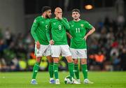 10 September 2024; Republic of Ireland players, from left, Andrew Omobamidele, Will Smallbone and Robbie Brady during the UEFA Nations League B Group 2 match between Republic of Ireland and Greece at Aviva Stadium in Dublin. Photo by Stephen McCarthy/Sportsfile