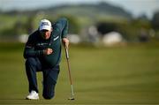12 September 2024; Padraig Harrington of Ireland lines up a putt on the 18th green during day one of the Amgen Irish Open Golf Championship 2024 at the Royal County Down Golf Club in Newcastle, Down. Photo by Brendan Moran/Sportsfile