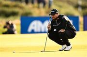 13 September 2024; Shane Lowry of Ireland lines up a putt on the 15th green during day two of the Amgen Irish Open Golf Championship 2024 at the Royal County Down Golf Club in Newcastle, Down. Photo by Ramsey Cardy/Sportsfile