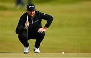 13 September 2024; Shane Lowry of Ireland lines up a putt on the 18th green during day two of the Amgen Irish Open Golf Championship 2024 at the Royal County Down Golf Club in Newcastle, Down. Photo by Brendan Moran/Sportsfile