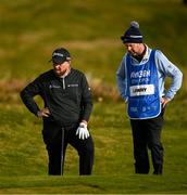 13 September 2024; Shane Lowry of Ireland and his caddie Darren Reynolds check their lie at the 17th  green during day two of the Amgen Irish Open Golf Championship 2024 at the Royal County Down Golf Club in Newcastle, Down. Photo by Brendan Moran/Sportsfile