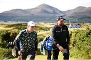 13 September 2024; Robert MacIntyre of Scotland, left, and Shane Lowry of Ireland make their way to the 4th tee box during day two of the Amgen Irish Open Golf Championship 2024 at the Royal County Down Golf Club in Newcastle, Down. Photo by Ramsey Cardy/Sportsfile