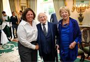 13 September 2024; OFI communications, PR and athletes' commission lead Heather Boyle poses for a photograph with President of Ireland Michael D Higgins and his wife Sabina Coyne during the Team Ireland homecoming at Áras an Uachtaráin in Dublin. Photo by David Fitzgerald/Sportsfile