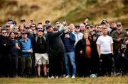 13 September 2024; Shane Lowry of Ireland watches his shot from the rough on the 9th fairway during day two of the Amgen Irish Open Golf Championship 2024 at the Royal County Down Golf Club in Newcastle, Down. Photo by Ramsey Cardy/Sportsfile
