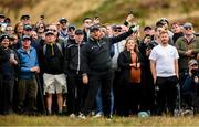 13 September 2024; Shane Lowry of Ireland calls 'fore' after his shot from the rough on the 9th fairway during day two of the Amgen Irish Open Golf Championship 2024 at the Royal County Down Golf Club in Newcastle, Down. Photo by Ramsey Cardy/Sportsfile