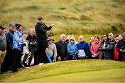 13 September 2024; Shane Lowry of Ireland reacts reacts to a rule official on the 9th green during day two of the Amgen Irish Open Golf Championship 2024 at the Royal County Down Golf Club in Newcastle, Down. Photo by Ramsey Cardy/Sportsfile