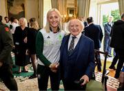 13 September 2024; Team Ireland athlete Sarah Lavin poses for a photograph with The President of Ireland Michael D Higgins during the Team Ireland homecoming at Áras an Uachtaráin in Dublin. Photo by David Fitzgerald/Sportsfile