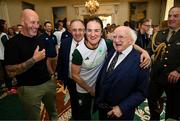 13 September 2024; The President of Ireland Michael D. Higgins poses for a photograph with Team Ireland boxer Kellie Harrington at the Team Ireland homecoming at Áras an Uachtaráin in Dublin. Photo by David Fitzgerald/Sportsfile