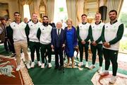 13 September 2024; The Team Ireland rugby 7s team, from left, Jordan Conroy, Gavin Mullin, Mark Roche, Sean Cribbin, Niall Comerford and Harry McNulty pose for a photograph with The President of Ireland Michael D Higgins and his wife Sabina Coyne during the Team Ireland homecoming at Áras an Uachtaráin in Dublin. Photo by David Fitzgerald/Sportsfile