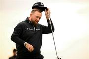 13 September 2024; Shane Lowry of Ireland reacts after a missed putt on the 9th green during day two of the Amgen Irish Open Golf Championship 2024 at the Royal County Down Golf Club in Newcastle, Down. Photo by Ramsey Cardy/Sportsfile