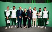 13 September 2024; Team Ireland Men's Rugby Sevens players, from left, Gavin Mullen, Harry McNulty, Jordan Conroy, Mark Roche, with his son Cooper, aged 13 weeks, and Sean Cribbin with First Minister of Northern Ireland Michelle O’Neill, centre, Tánaiste Micheál Martin TD, centre left, and An Taoiseach Simon Harris TD during the Team Ireland homecoming at the Dublin Castle Printworks in Dublin. Photo by Seb Daly/Sportsfile