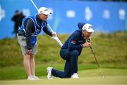 13 September 2024; Padraig Harrington of Ireland lines up a putt on the 18th green with his caddy Ronan Flood during day two of the Amgen Irish Open Golf Championship 2024 at the Royal County Down Golf Club in Newcastle, Down. Photo by Ramsey Cardy/Sportsfile