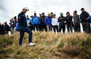 13 September 2024; Padraig Harrington of Ireland looks for his ball in the rough on the 18th fairway during day two of the Amgen Irish Open Golf Championship 2024 at the Royal County Down Golf Club in Newcastle, Down. Photo by Ramsey Cardy/Sportsfile