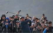 14 September 2024; Shane Lowry of Ireland drives from the second tee box as spectators record on their smartphones during day three of the Amgen Irish Open Golf Championship 2024 at the Royal County Down Golf Club in Newcastle, Down. Photo by Brendan Moran/Sportsfile