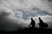 14 September 2024; Shane Lowry of Ireland and his caddie Darren Reynolds make their way from the second tee box during day three of the Amgen Irish Open Golf Championship 2024 at the Royal County Down Golf Club in Newcastle, Down. Photo by Brendan Moran/Sportsfile
