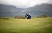 14 September 2024; Seamus Power of Ireland lines up a putt on the 10th green during day three of the Amgen Irish Open Golf Championship 2024 at the Royal County Down Golf Club in Newcastle, Down. Photo by Ramsey Cardy/Sportsfile