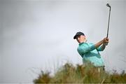 14 September 2024; Seán Keeling of Ireland watches is shot from the rough on the fifth fairway during day three of the Amgen Irish Open Golf Championship 2024 at the Royal County Down Golf Club in Newcastle, Down. Photo by Ramsey Cardy/Sportsfile