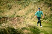 14 September 2024; Seán Keeling of Ireland walks to the sixth tee box during day three of the Amgen Irish Open Golf Championship 2024 at the Royal County Down Golf Club in Newcastle, Down. Photo by Ramsey Cardy/Sportsfile