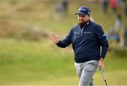 14 September 2024; Shane Lowry of Ireland acknowledges the gallery after a birdie on the second green during day three of the Amgen Irish Open Golf Championship 2024 at the Royal County Down Golf Club in Newcastle, Down. Photo by Ramsey Cardy/Sportsfile