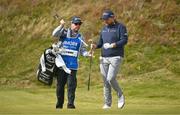 14 September 2024; Shane Lowry of Ireland with his caddie Darren Reynolds during day three of the Amgen Irish Open Golf Championship 2024 at the Royal County Down Golf Club in Newcastle, Down. Photo by Brendan Moran/Sportsfile