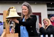 14 September 2024; Former Ireland cricket international Cecelia Joyce rings the Roy Torrens bell before match one of the Women's T20 International Series between Ireland and England at Clontarf in Dublin. Photo by Piaras Ó Mídheach/Sportsfile