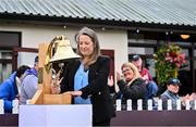14 September 2024; Former Ireland cricket international Cecelia Joyce rings the Roy Torrens bell before match one of the Women's T20 International Series between Ireland and England at Clontarf in Dublin. Photo by Piaras Ó Mídheach/Sportsfile