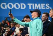 14 September 2024; Seán Keeling of Ireland poses for a selfie with fans during day three of the Amgen Irish Open Golf Championship 2024 at the Royal County Down Golf Club in Newcastle, Down. Photo by Ramsey Cardy/Sportsfile