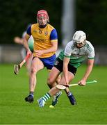 14 September 2024; Shane Coffey of Lucan Sarsfields in action against AJ Murphy of Na Fianna during the Dublin Senior 1 Hurling Championship Group 1 match between Lucan and Na Fianna at Parnell Park in Dublin. Photo by Stephen Marken/Sportsfile