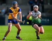 14 September 2024; Joe Kavanagh of Na Fianna scores his side's first goal despite the best efforts of Colm Walsh of Lucan Sarsfields during the Dublin Senior 1 Hurling Championship Group 1 match between Lucan and Na Fianna at Parnell Park in Dublin. Photo by Stephen Marken/Sportsfile