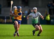 14 September 2024; Joe Kavanagh of Na Fianna scores his side's first goal despite the best efforts of Colm Walsh of Lucan Sarsfields during the Dublin Senior 1 Hurling Championship Group 1 match between Lucan and Na Fianna at Parnell Park in Dublin. Photo by Stephen Marken/Sportsfile