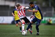 14 September 2024; Rayhaan Tulloch of Shelbourne in action against Ronan Boyce of Derry City during the Sports Direct Men's FAI Cup Quarter Final match between Derry City and Shelbourne at the The Ryan McBride Brandywell Stadium in Derry. Photo by Ben McShane/Sportsfile