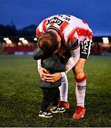 14 September 2024; Paul McMullan of Derry City shares a moment with his son Patrick after the Sports Direct Men's FAI Cup Quarter Final match between Derry City and Shelbourne at the The Ryan McBride Brandywell Stadium in Derry. Photo by Ben McShane/Sportsfile