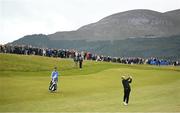 15 September 2024; Shane Lowry of Ireland watches his shot from the first fairway during day four of the Amgen Irish Open Golf Championship 2024 at the Royal County Down Golf Club in Newcastle, Down. Photo by Ramsey Cardy/Sportsfile