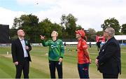 15 September 2024; TV presenter Duane Dell-Oca with Ireland captain Gaby Lewis and England captain Kate Cross and match referee Phil Thompson, right, for the coin toss before match two of the Women's T20 International Series between Ireland and England at Clontarf in Dublin. Photo by Piaras Ó Mídheach/Sportsfile