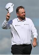 15 September 2024; Shane Lowry of Ireland acknowledges the gallery after finishing his round on the 18th green during day four of the Amgen Irish Open Golf Championship 2024 at the Royal County Down Golf Club in Newcastle, Down. Photo by Brendan Moran/Sportsfile