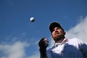 15 September 2024; Shane Lowry of Ireland throws a ball to the gallery as he leaves the 18th green after finishing his round during day four of the Amgen Irish Open Golf Championship 2024 at the Royal County Down Golf Club in Newcastle, Down. Photo by Brendan Moran/Sportsfile