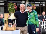 15 September 2024; Former Ireland cricketer Alan Lewis with his daughter Ireland captain Gaby Lewis after ringing the Roy Torrens bell before match two of the Women's T20 International Series between Ireland and England at Clontarf in Dublin. Photo by Piaras Ó Mídheach/Sportsfile