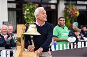 15 September 2024; Former Ireland cricketer Alan Lewis rings the Roy Torrens bell before match two of the Women's T20 International Series between Ireland and England at Clontarf in Dublin. Photo by Piaras Ó Mídheach/Sportsfile