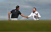 15 September 2024; Shane Lowry of Ireland with Jannik de Bruyn of Germany after finishing their round during day four of the Amgen Irish Open Golf Championship 2024 at the Royal County Down Golf Club in Newcastle, Down. Photo by Brendan Moran/Sportsfile