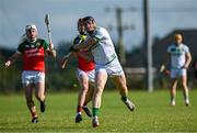 15 September 2024; Paddy Mullen of Shamrocks Ballyhale in action against Ed Lauhoff of James Stephens during the Kilkenny Senior Hurling Championship Relegation Semi-Final match between James Stephens and Shamrocks Ballyhale at John Locke Park, Callan in Kilkenny. Photo by Shauna Clinton/Sportsfile