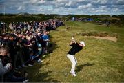 15 September 2024; Rory McIlroy of Northern Ireland plays a shot from the rough on the 12th fairway during day four of the Amgen Irish Open Golf Championship 2024 at the Royal County Down Golf Club in Newcastle, Down. Photo by Ramsey Cardy/Sportsfile