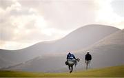 15 September 2024; Rory McIlroy of Northern Ireland with his caddy Harry Diamond on the 15th fairway during day four of the Amgen Irish Open Golf Championship 2024 at the Royal County Down Golf Club in Newcastle, Down. Photo by Ramsey Cardy/Sportsfile