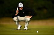 15 September 2024; Rory McIlroy of Northern Ireland lines up a putt on the 16th green during day four of the Amgen Irish Open Golf Championship 2024 at the Royal County Down Golf Club in Newcastle, Down. Photo by Ramsey Cardy/Sportsfile