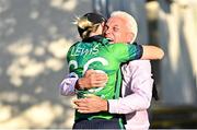 15 September 2024; Former Ireland cricketer Alan Lewis with his daughter Ireland captain Gaby Lewis after the match two of the Women's T20 International Series between Ireland and England at Clontarf in Dublin. Photo by Piaras Ó Mídheach/Sportsfile