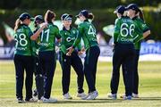 15 September 2024; Ireland players celebrate during match two of the Women's T20 International Series between Ireland and England at Clontarf in Dublin. Photo by Piaras Ó Mídheach/Sportsfile