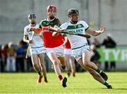 15 September 2024; Darragh Corcoran of Shamrocks Ballyhale in action against Ed Lauhoff of James Stephens during the Kilkenny Senior Hurling Championship Relegation Semi-Final match between James Stephens and Shamrocks Ballyhale at John Locke Park, Callan in Kilkenny. Photo by Shauna Clinton/Sportsfile