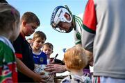 15 September 2024; TJ Reid of Shamrocks Ballyhale signs a football for a young supporter after the Kilkenny Senior Hurling Championship Relegation Semi-Final match between James Stephens and Shamrocks Ballyhale at John Locke Park, Callan in Kilkenny. Photo by Shauna Clinton/Sportsfile