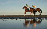 16 September 2024; Free Solo, with Ray Barron up, left, and Hightimeyouwon, with Donagh O'Connor up, during the ONEILLS.COM Handicap at the Laytown Races in Laytown, Meath. Photo by Ramsey Cardy/Sportsfile